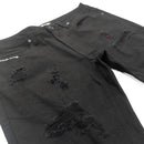 Black distressed jeans on a white background. by Fresh N fitted