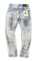 Light blue denim jeans shown from the back, featuring a faded wash, ripped details, and a paper size tag on the back pocket. By Fresh N Fitted.