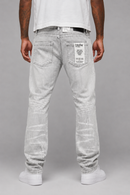 Evolution Faded Relaxed Straight Grey Denim jeans showing the distressed fabric, relaxed fit, and classic five-pocket design.