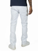Person wearing white pants on a white background. By Fresh N Fitted