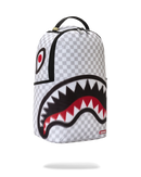 A Spraycraft shark-mouth backpack featuring a gray and white checkerboard pattern, with a large black, white, and red shark face graphic on the front, shown against a plain white background. By Fresh N Fitted
