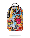 A Spray Ground backpack featuring a vibrant collage print with pop-art elements, including a pink tongue with a diamond-shaped gem, a leopard-print mouth, and bold text like 'SPRAY GROUND' and 'Live Now!'.