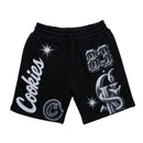 Black sweat shorts with white and silver graphic prints, including the word 'Cookies' on one leg, the number '83' on the other, and a stylized 'C' logo with starburst accents. By Fresh N Fitted.