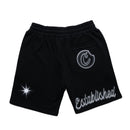 Black athletic shorts with a white embroidered 'C' logo on the back pocket, a starburst on the left leg, and 'Established' script on the right leg, shown on a plain white background. By Fresh N Fitted.