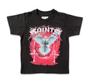 A black short-sleeve graphic t-shirt featuring a large front print with the word 'SAINTS' in white and red, an angel with wings, a cross, and a red flame-like circular design, shown on a plain white background. By Fresh N Fitted.