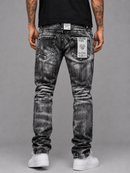 Evolution 'Faded' Relaxed Straight Black Denim jeans, men's casual fit, displayed in a streetwear store setting.