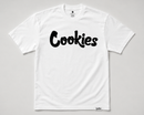 A white short-sleeve crewneck t-shirt with the word 'Cookies' printed across the chest in a bold black cursive font, shown flat against a light gray background. By Fresh N Fitted