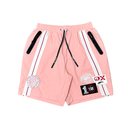 Pink athletic shorts with white side stripes, black zipper details, and multiple brand patches including 1Degree and AX, shown on a plain white background. by Fresh N Fitted