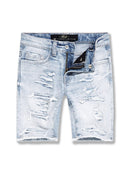 Light blue denim shorts with distressed details on a white background