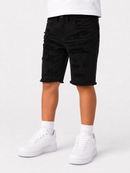 Black distressed denim shorts with frayed hems and multiple cargo-style pockets, shown on a model from the waist down wearing white sneakers and white socks against a light gray studio background.