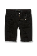 Black denim shorts with gold buttons on a white background