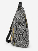 Sling bag with snake print pattern on a white background