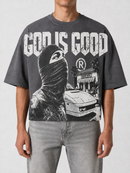 Grey Papercut 'God is Good' oversized cropped T-shirt with bold printed text and relaxed fit.