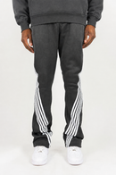Rebel Minds Five Stripes stacked grey and white sweatpants with a relaxed fit and elastic waistband.