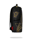 A black backpack featuring gold tribal-style geometric patterns and a purple eye motif on the front pocket, with a small red accent on the side, shown against a plain white background.