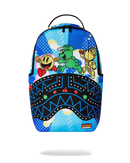 A sprayground backpack featuring a colorful graphic print with cartoon characters and geometric patterns, shown against a plain white background.