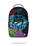 A sprayground black backpack featuring a colorful graffiti-style Darth Vader graphic with bright blue, pink, green, and purple spray-paint effects, shown on a clean white background.
