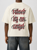 Cream oversized cropped T-shirt by Silent Verse featuring the "Raised By An Angel" graphic design.