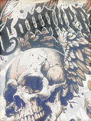 FRESH N FITTED cream tapestry t-shirt with skull and rhinestone 'Conquer' graphic. Features feather details.